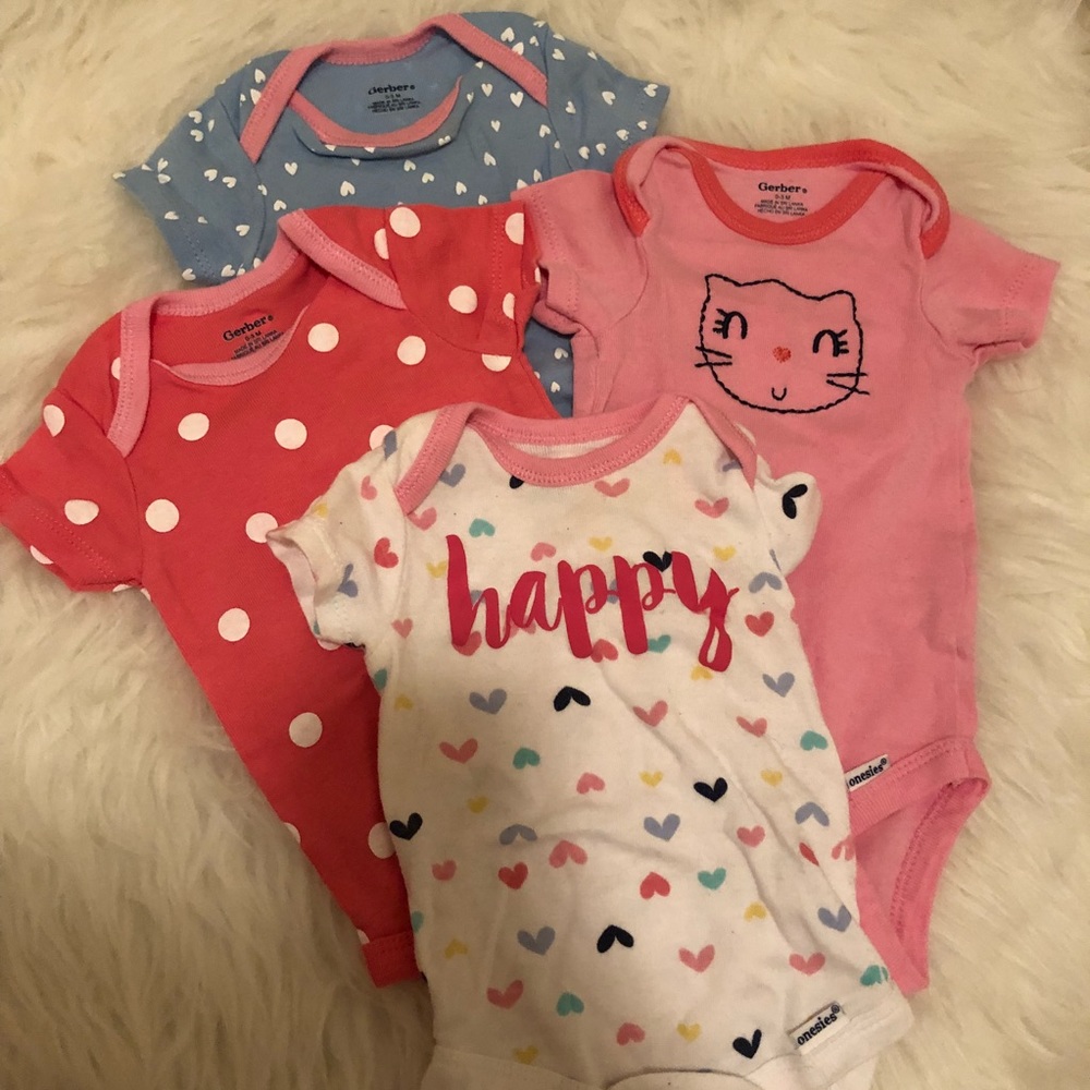 Four piece onesie set by Gerber